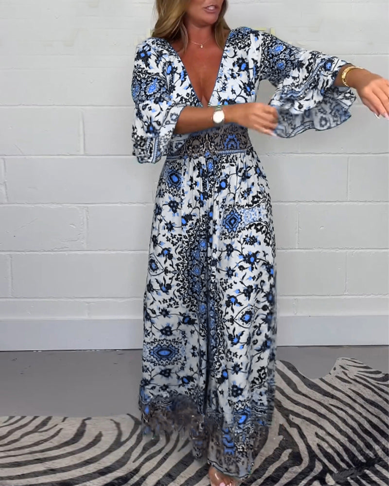 Laluna® | Bedrukte jumpsuit met diepe V-halslijn