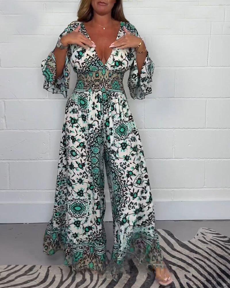 Laluna® | Bedrukte jumpsuit met diepe V-halslijn