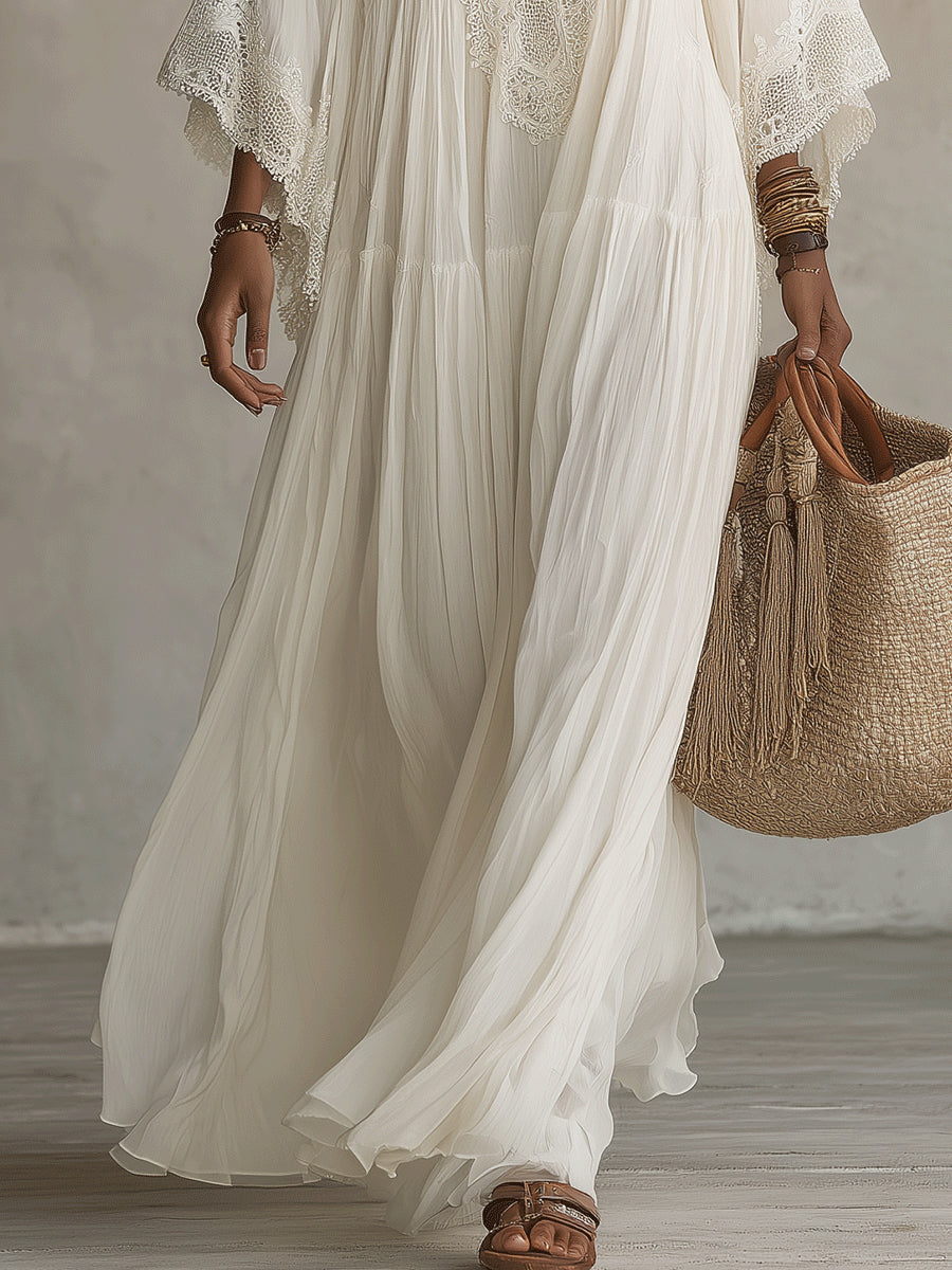 Fleur | Lange ivoorkleurige chiffon jurk met vleermuismouwen en wit kant