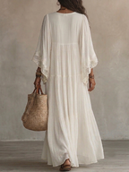 Fleur | Lange ivoorkleurige chiffon jurk met vleermuismouwen en wit kant