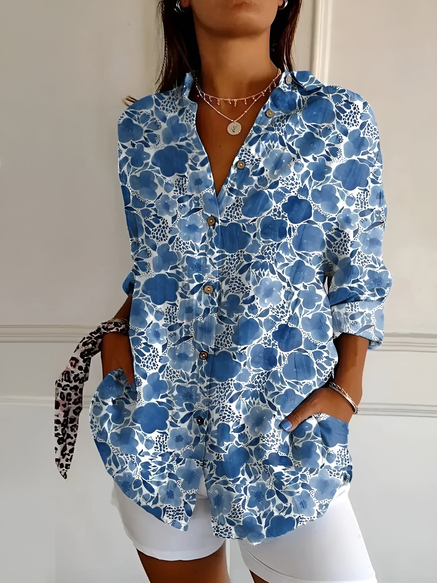 Vloeiende bedrukte blouse